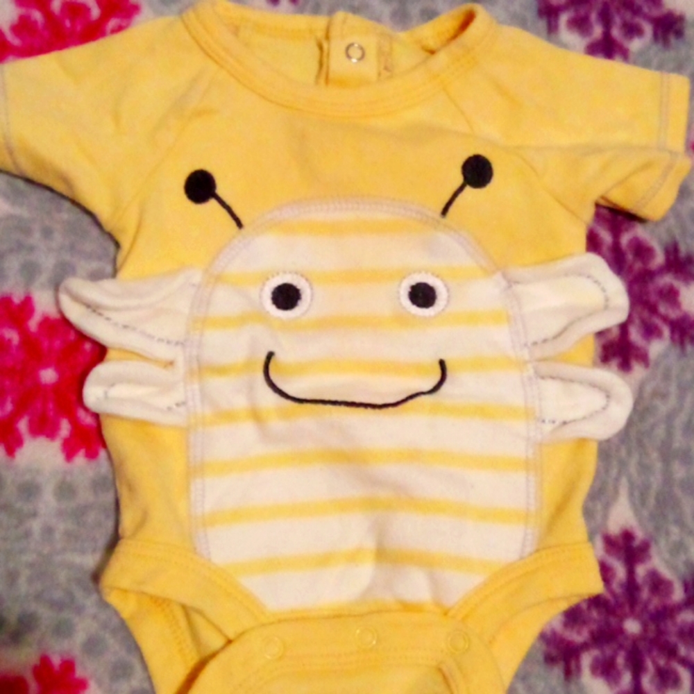 Baby one piece suit. Neutral. 0-3 months. Yellow and white.